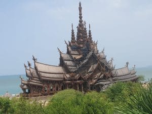 A large temple among some greenery.
